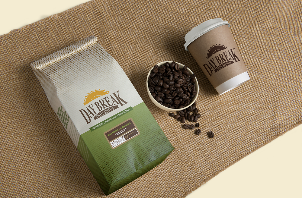 Day Break Guatemalan Antigua coffee bag, beans, and coffee cup